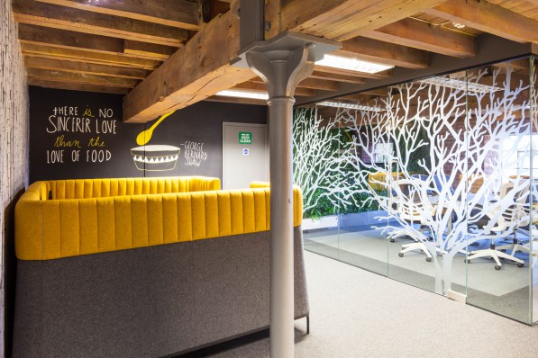 Office with dining area and mirror art wall