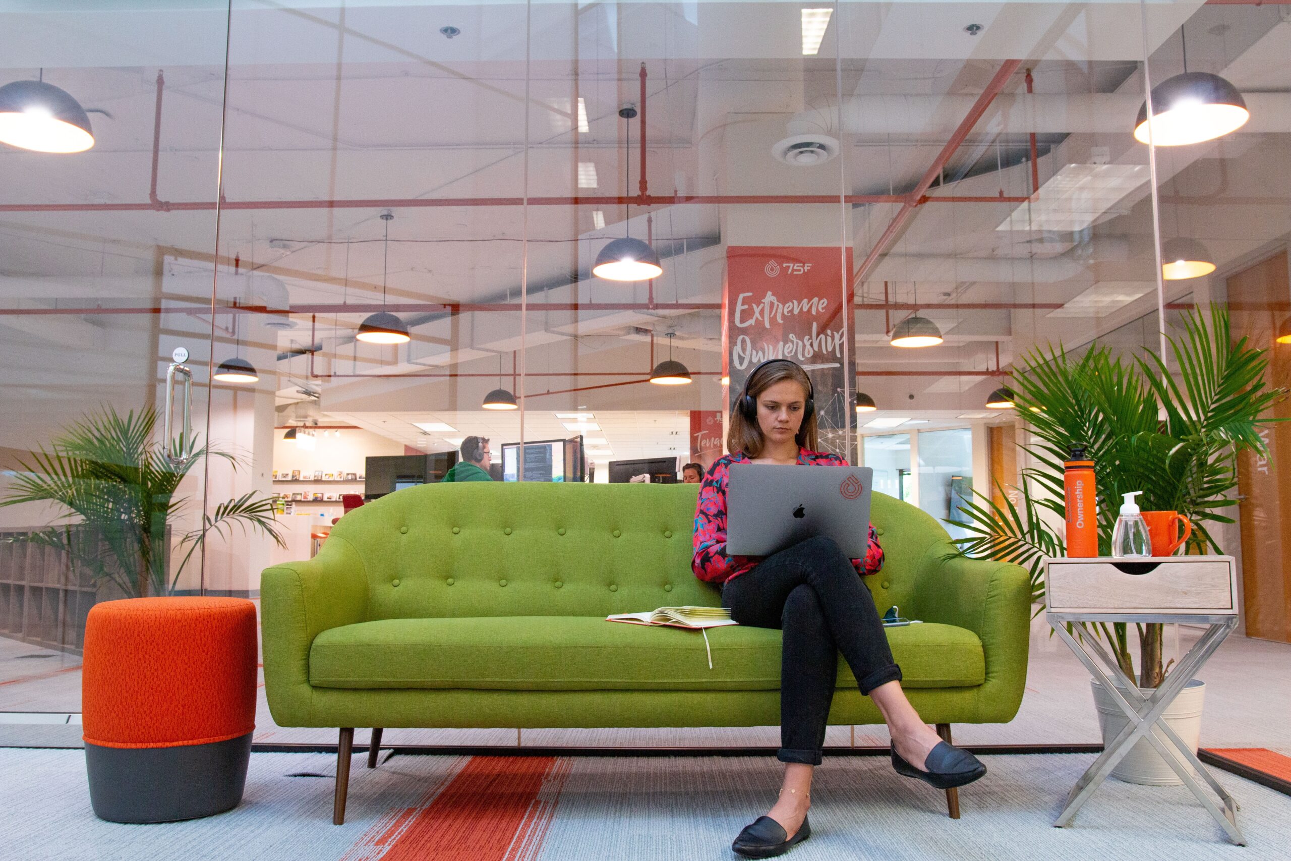 Woman working in touchdown area